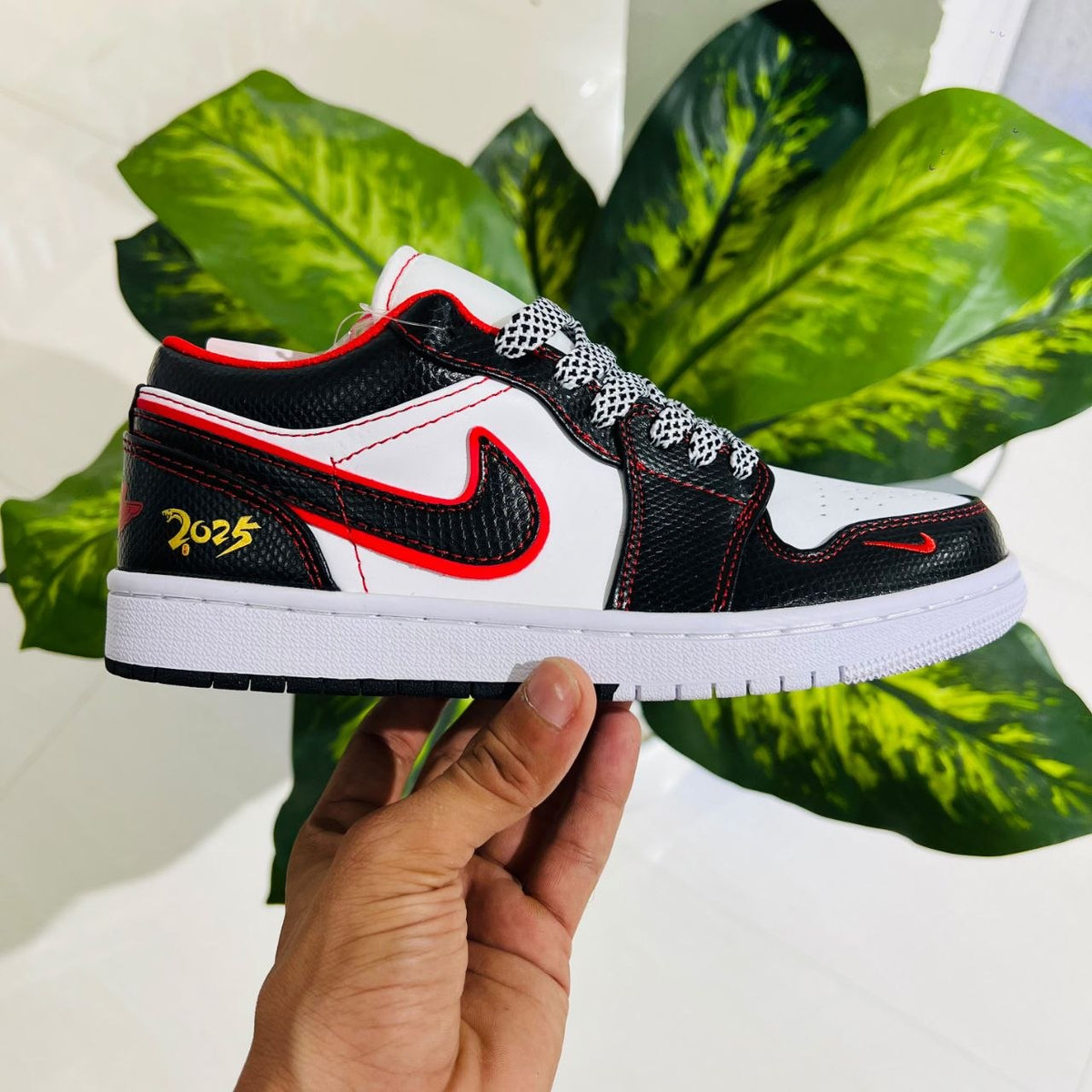 Shoes nike air jordan 1 low 2025 black white red