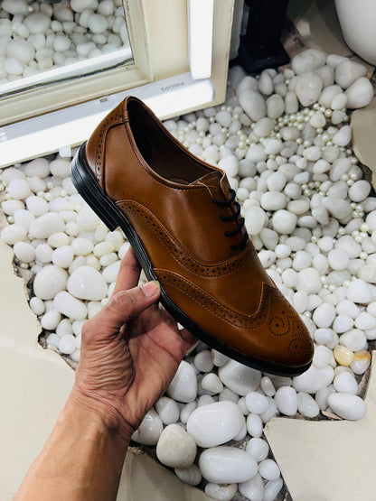 Formal belly brogue tan