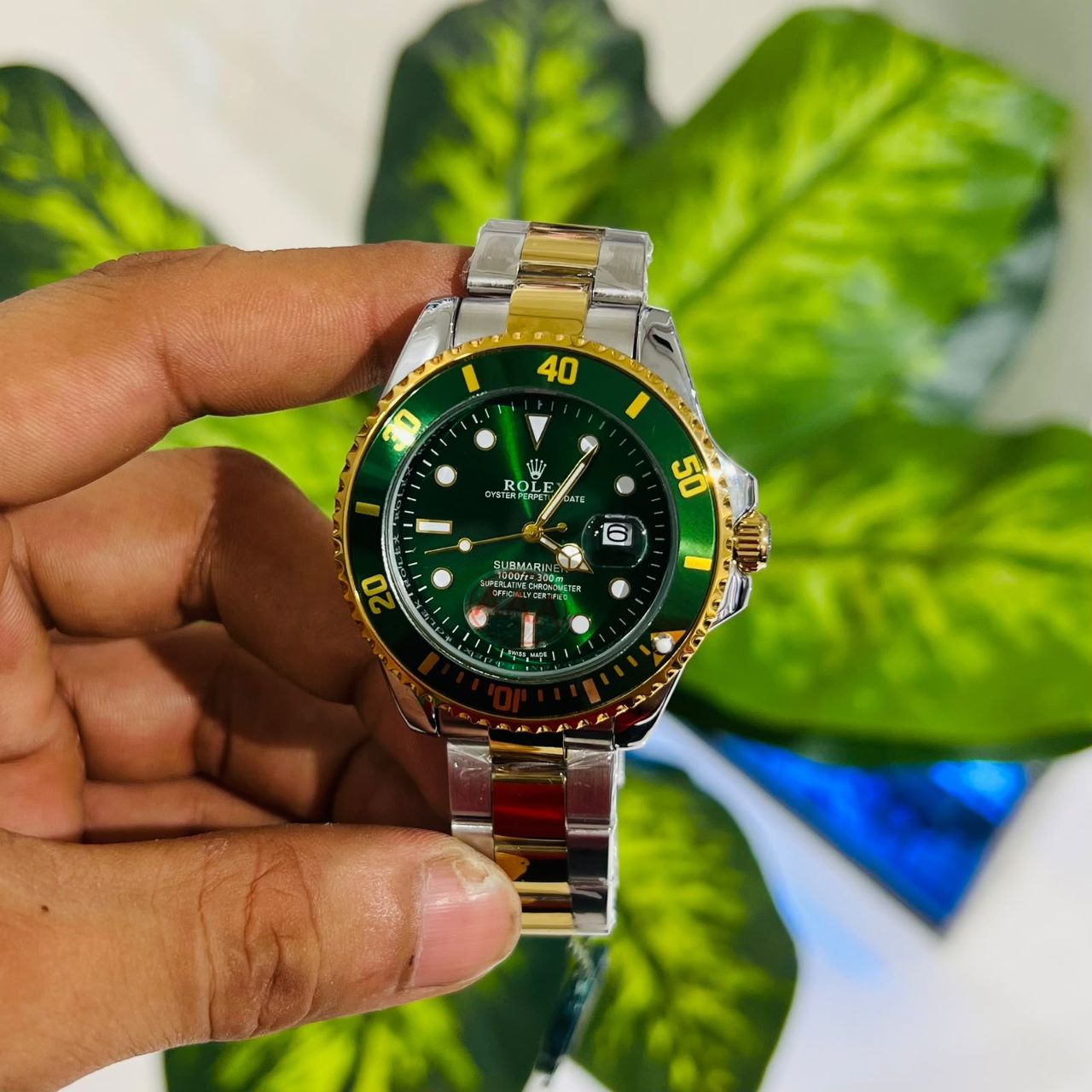 Watch rolex submariner silver gold green