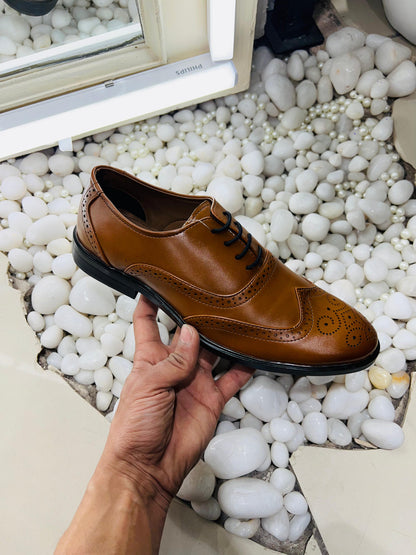 Formal belly brogue tan
