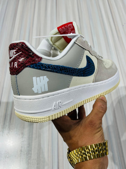 Shoes nike airforce 1 x undefeated 5 on it