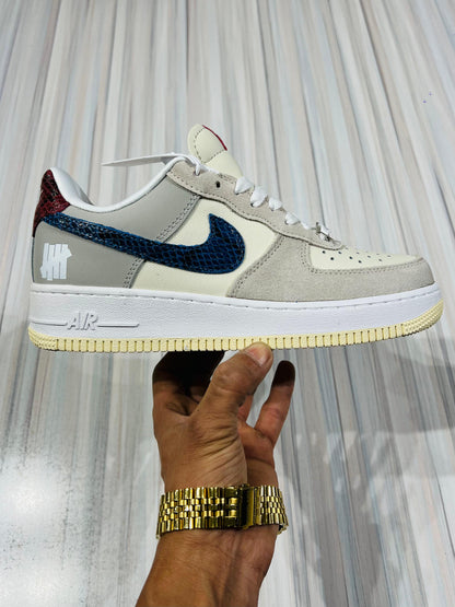 Shoes nike airforce 1 x undefeated 5 on it