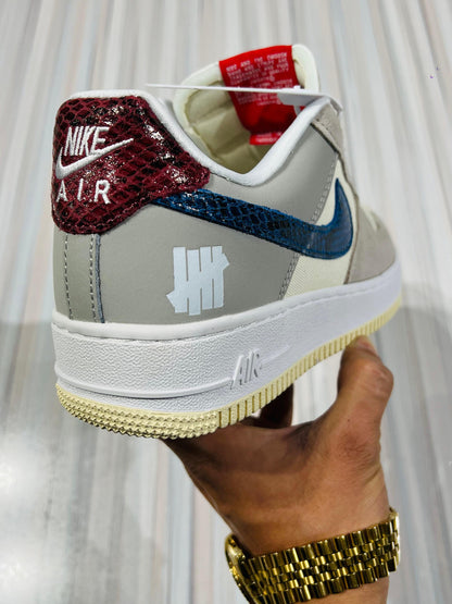 Shoes nike airforce 1 x undefeated 5 on it