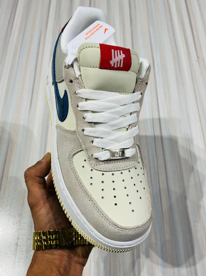 Shoes nike airforce 1 x undefeated 5 on it